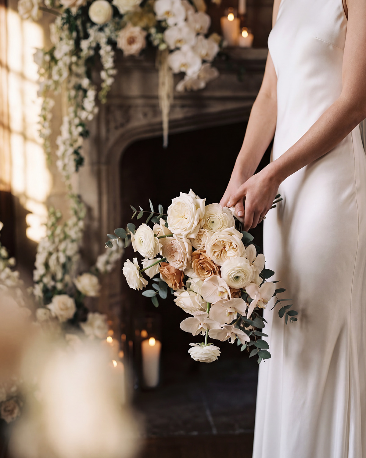 Ceremony aisle dressed with white florals.